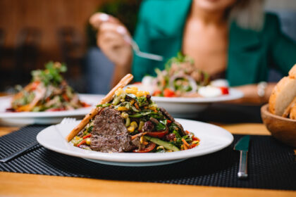 A diner enjoying food
